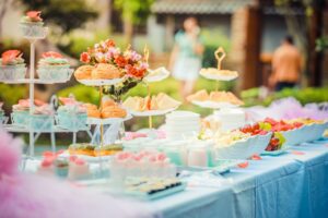 a buffet table with delicious treats, perfect for arranging a baby shower