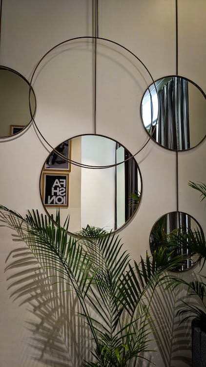 mirrors add the illusion of space in home decor hacks